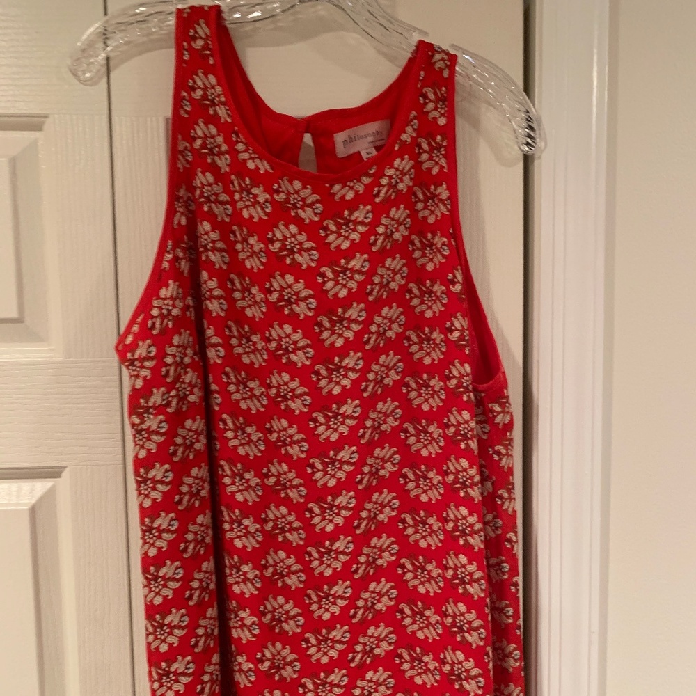 Red tank top with cream floral print